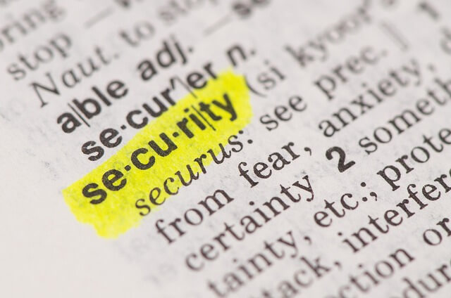 The word 'security' highlighted in a dictionary.